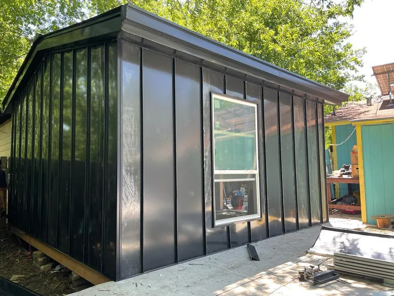 Black standing seam metal wall panels for Metal Roof Installation in St. John